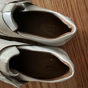 Cream colored leather Clark’s tennis Shoes. Size 11 wide-women. Never worn.